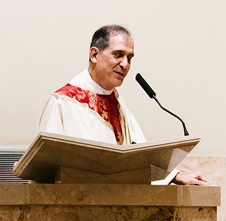 Father Bernard Ezaki speaking at Father David Matthew Anthony's first Mass.